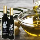 Fine Olive Oil bottles and bowl of olive oil