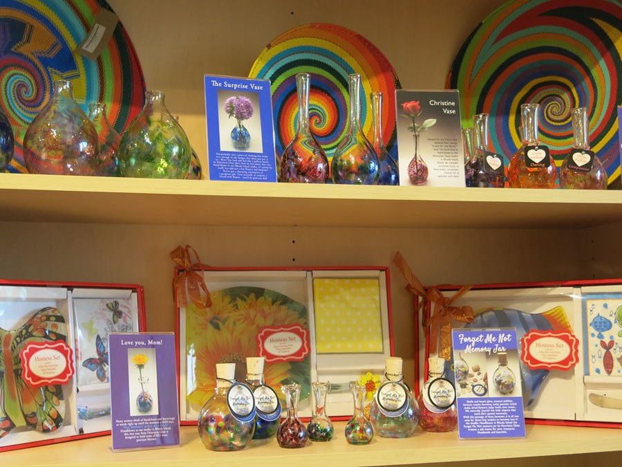 dishes and trinkets on shelves for sale
