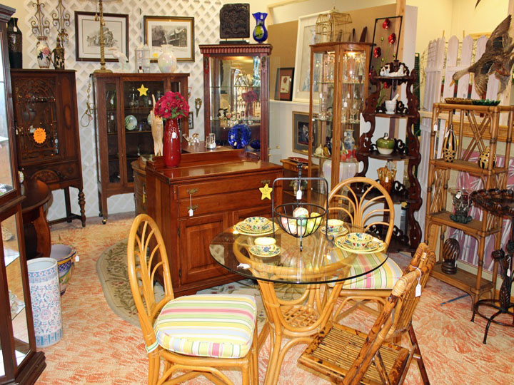 Table chairs and misc. furniture in showroom at antique mall