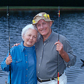 Man and woman with fishing poles
