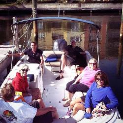 Family sitting on a Pontoon boat