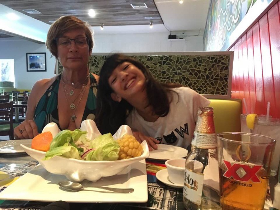 Mom and daughter enjoying a salad