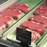 Steaks in a meat case