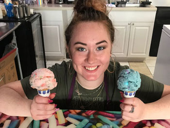 Riley holding two Ice cream cones