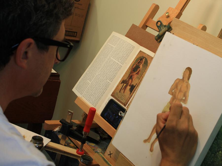 man drawing humane figure